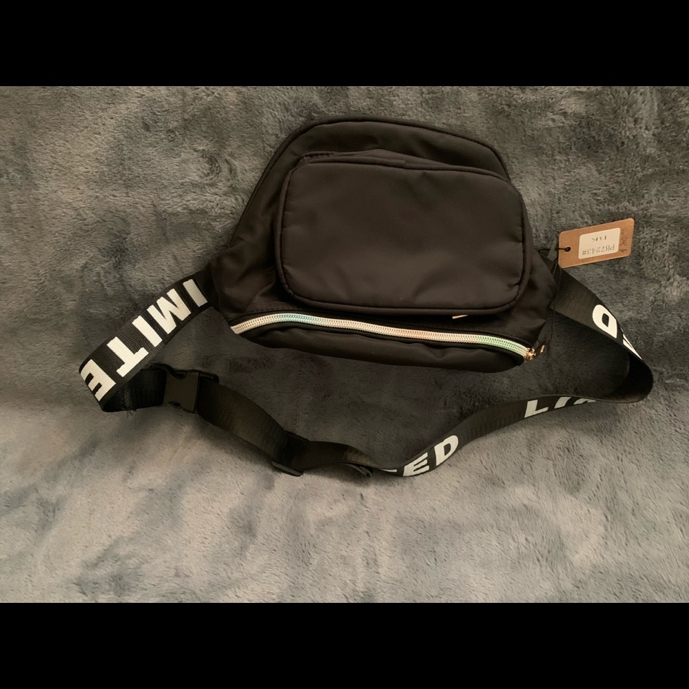 Black Fanny pack with multicolor zipper.